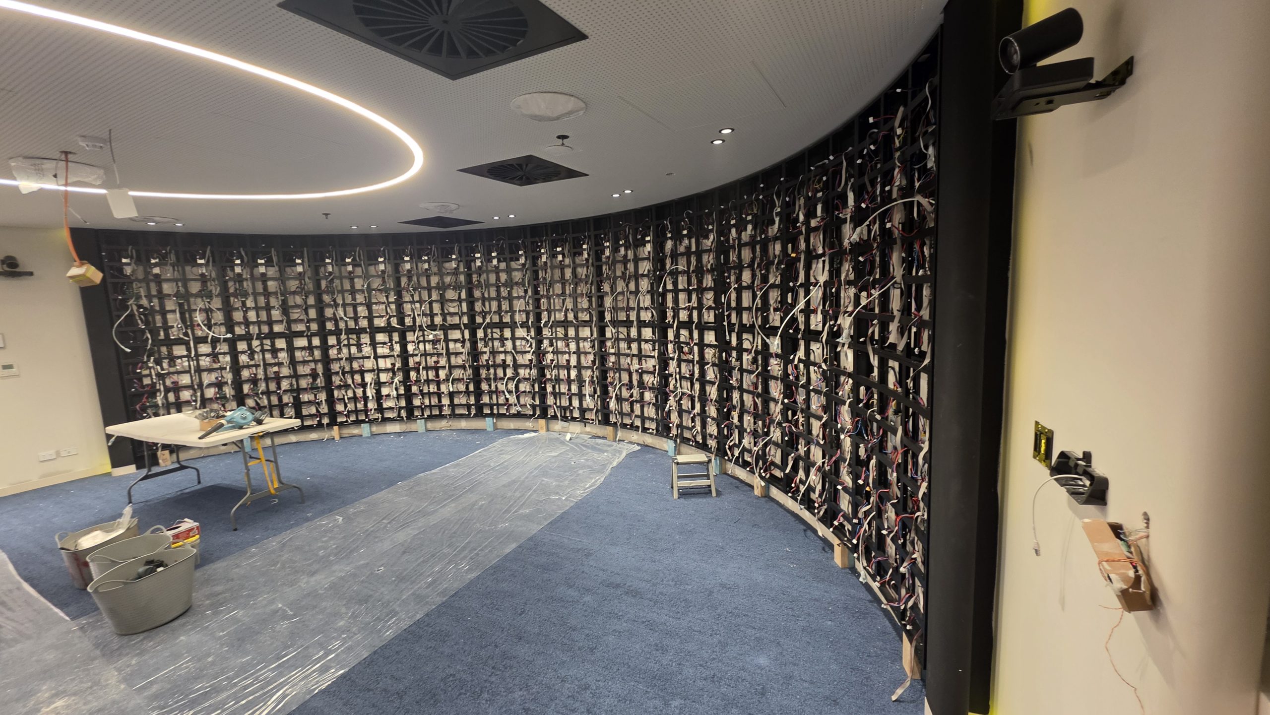 Curved LED wall structure during installation